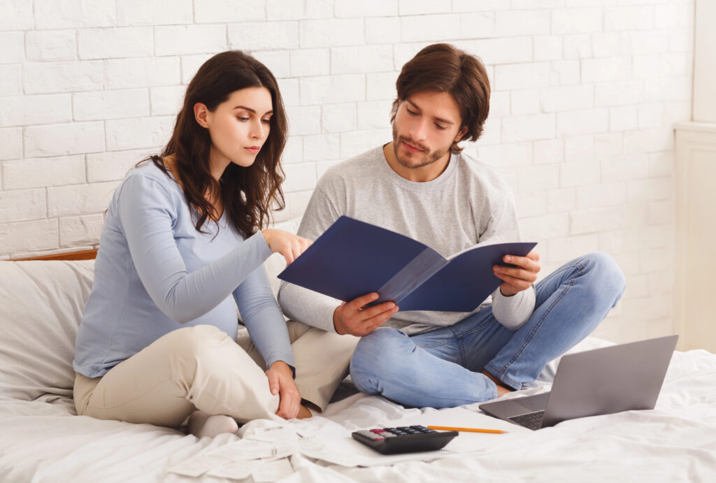 Married couple with financial documents