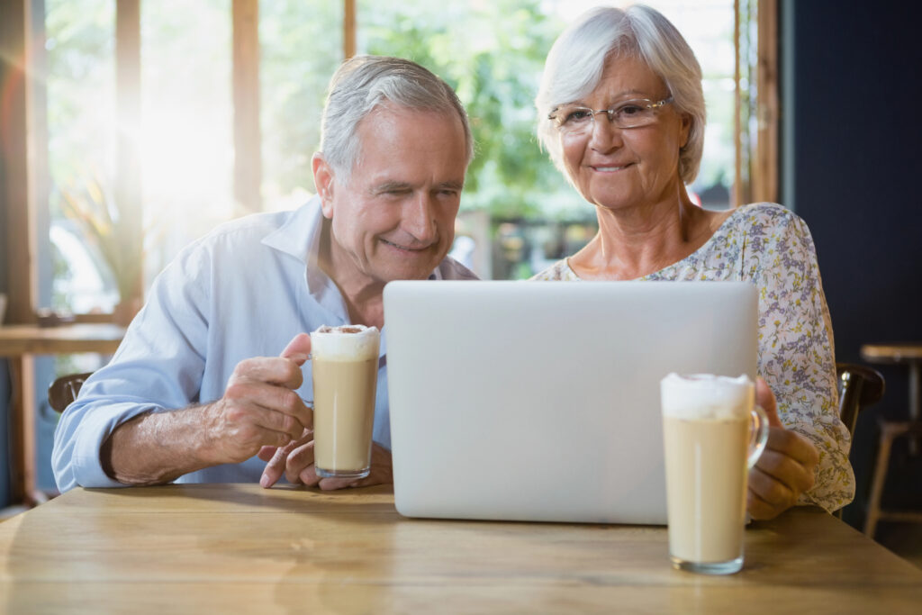 Older couple using laptop for financial planning